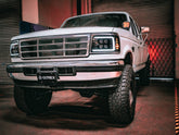 92-96 Ford F-Series/Bronco NOVA-Series LED Projector Headlights Black | AlphaRex