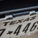 Flip up license plate bracket