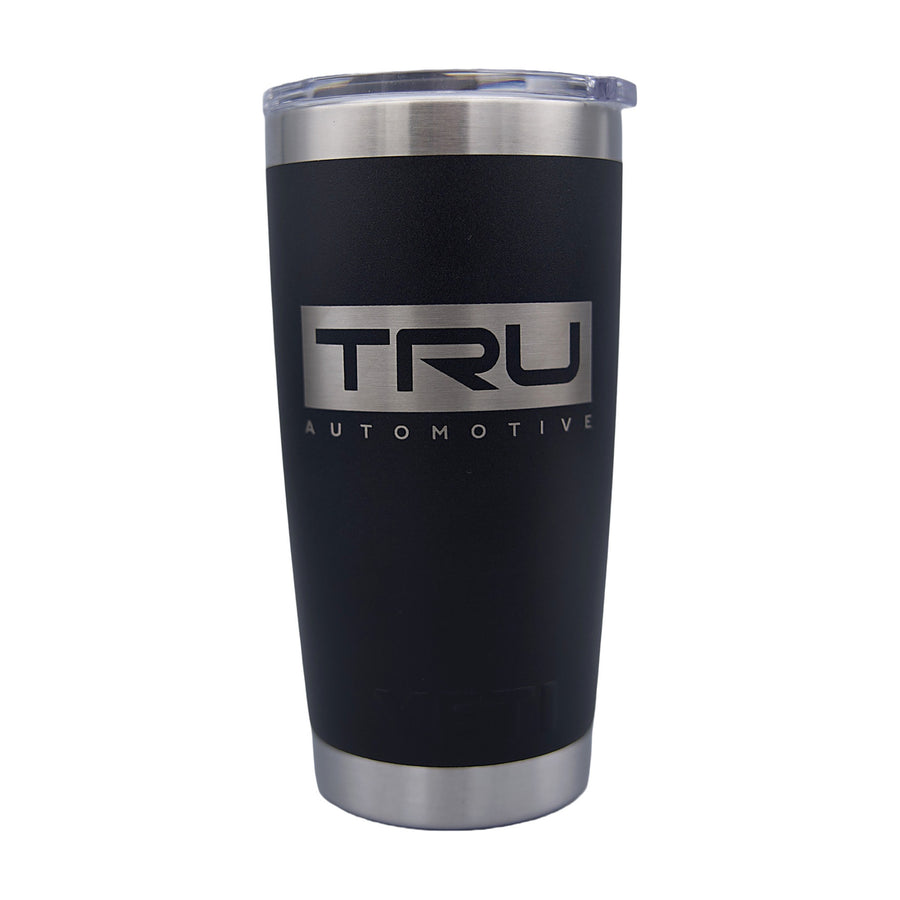 Tru Automotive YETI Rambler 20 oz Tumbler in Black with laser engraved TRU Automotive box logo, white background