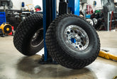 Off-road wheel and tire mounted ready for install at Tru Automotive Denver shop